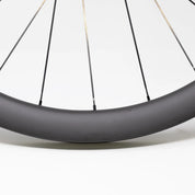 Roue complète Reserve 42|49 Turbulent Aero CL DT 350 HG11 (défaut esthétique)