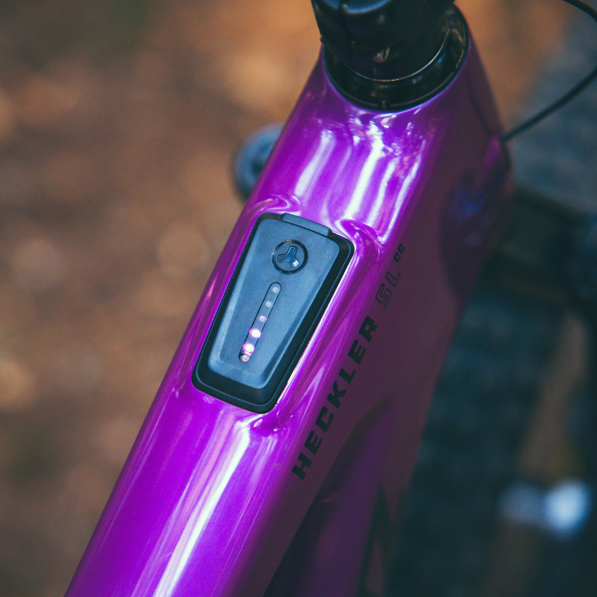 FAZUA Ride Control computer mounted in Magenta Santa Cruz Heckler SL top tube